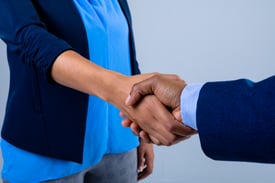 mid-section-of-businessman-and-businesswoman-shaki-2025-04-03-12-53-25-utc